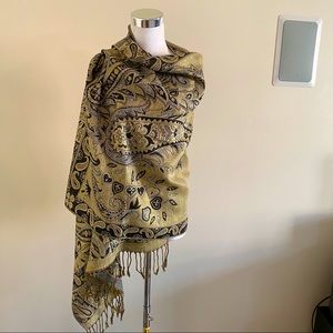 Green Pashmina wrap with a paisley print.